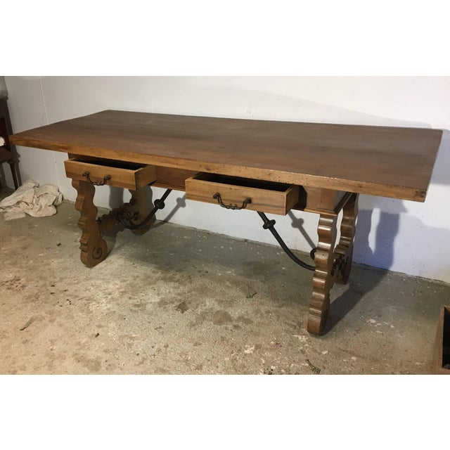 This elegant, antique fruitwood desk was crafted in Spain, circa 1780. The rustic writing table has been stripped down...