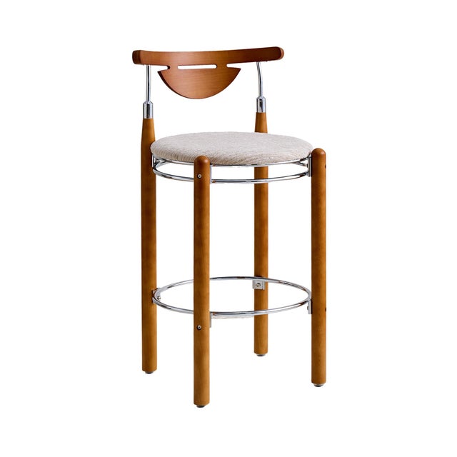 The Nikko Stool combines clean, minimalist design with eye-catching detail. Crafted from smooth plywood and upholstered in...