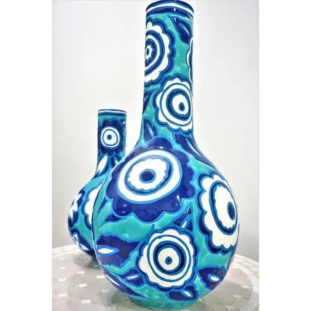 Made in Italy, this set of two matching style vases is crafted using the best pottery techniques of southern Italy. Bold...