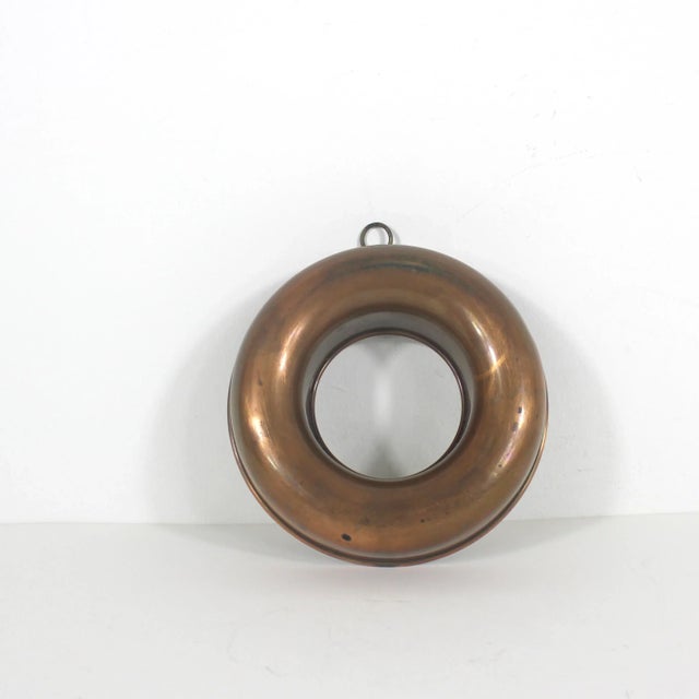 Old French style copper round ring mould. This has some nice heavy patina and would make a great kitchen display. Has a...