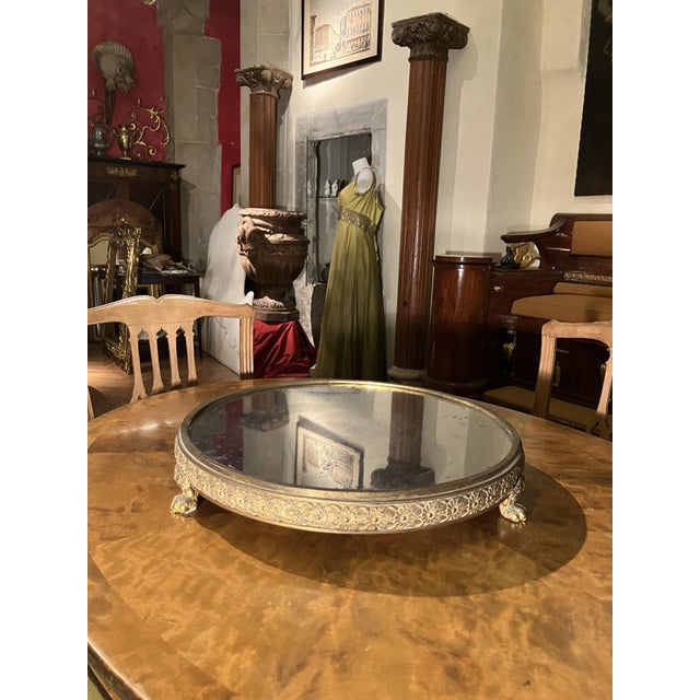 A magnificent large antique Tuscan Empire ormolu mirror plateau centerpiece from a historic Italian villa, finely crafted...