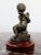 Charming little bronze with a brunette patina, according to the work of Louis Key (1833-1911) featured a cherub, signed on...