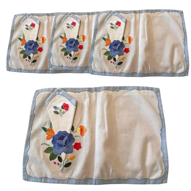 Stunning vintage set of placemats with a napkin holder compartment. The compartment can be used as a utensil holder as...