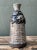 This vintage handcrafted ceramic vase embodies rustic, artisanal charm characteristic of mid-20th-century studio pottery....