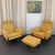 This set of two Mid-Century Modern, high-back lounge chairs with a matching ottoman is American made circa the 1960s. The...