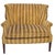 A charming vintage Victorian-style wingback loveseat settee, upholstered in luxuriously soft striped velvet with a rich...