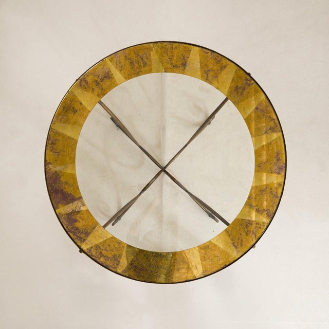A French cocktail table from the 1940s, defined by its delicate ironwork and light-catching glass top. Sourced in Paris,...