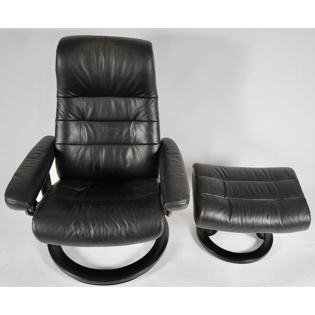 Ekrones lounge chair with ottoman. The Leather and wood are in very good condition, it doesn't look like this chair was...