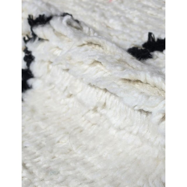 Colorful Azilal Rug – Handmade Moroccan Berber Wool Rug This handmade Azilal rug blends bold Berber symbolism with a...