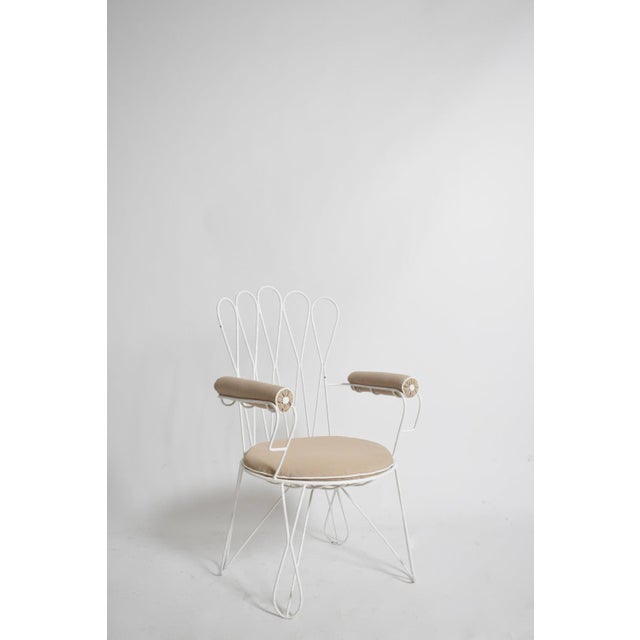 Pair of garden white wrought iron chairs, 1960s. Height: 81 cm - 31.89 in Length: 63 cm - 24.8 in Width: 57 cm - 22.44 in...