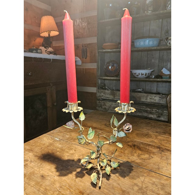 This charming mid-century Italian toleware candelabra boasts a romantic, hand-formed design with delicate rose blossoms...