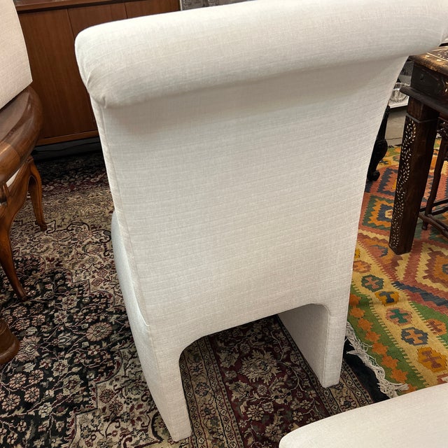 Set of 8 gorgeously upholstered post modern chairs for dining. Seating for 8 or for a smaller group with extra chairs on...