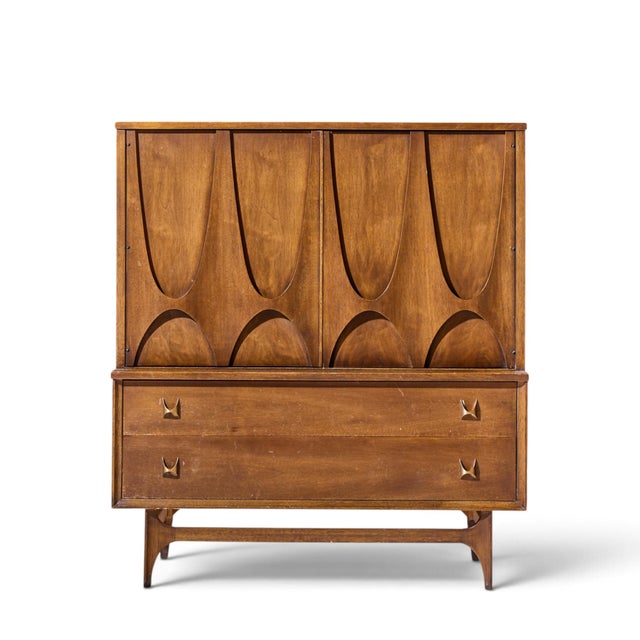 Broyhill Brasilia Mid Century Walnut and Brass Gentlemans Chest Highboy Dresser This highboy measures: 44 wide x 19.25...