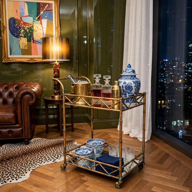 Masterfully reimagined with a custom artisan finish by Turtle and Crane Atelier, this bar cart is a striking, luminous...