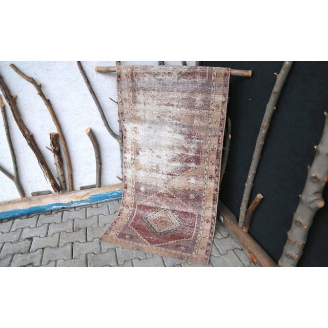 This spectacular Turkish runner rug was handmade in Anatolian lands in the mid 20th century. This Vintage Oushak runner...