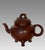An impressive and signed / artist chopped / hall marked fine Yixing Zisha unglazed teapot topped with a Vine finial/knob....