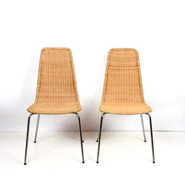 Beautiful mid-century set of four wicker and chromed metal Italian chairs with removable rattan seat. These amazing pieces...