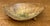 This striking Mid-Century Modern tripod bowl is a masterclass in organic form and textural glaze work. Hand-crafted with a...