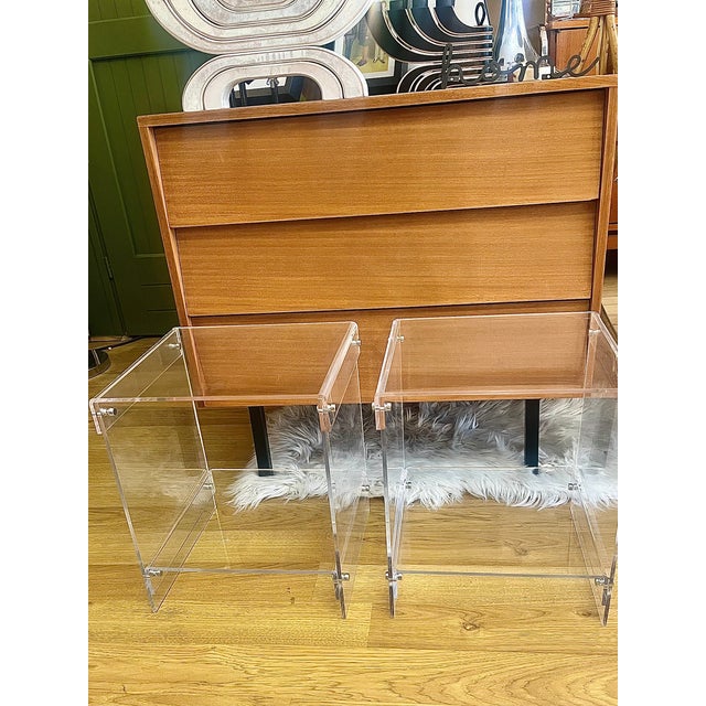 Pair of acrylic glass bedside tables designed by Michel Dumas for Roche Bobois, dating from the 1970s. Made entirely of...