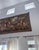 Monumental woven tapestry wall hanging depicting an elaborate classical pastoral scene with robed figures, putti and...