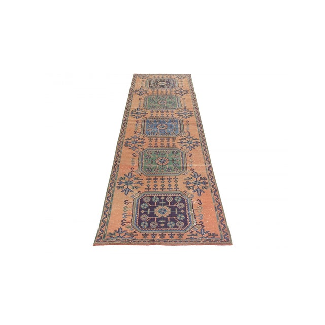Decorative washed out handknotted vintage rug from Konya region of Turkey. Approximately 50-60 years old. In very good...
