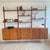 Danish vintage modular shelv wall unit manufactured in denmark in the 1960s -70s. This shelving teak wall unit with 3...