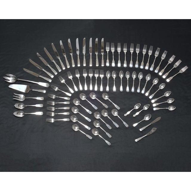 An expansive 72 piece heavy set of faithfully reproduced coin silver pattern from the original Colonial die owned by...