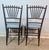 A stunning and rare pair of late 19th-century American Aesthetic Movement faux bamboo side chairs, circa 1880. Strongly...