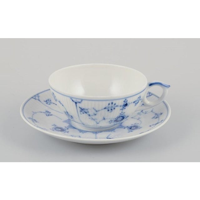 Royal Copenhagen Blue Fluted Plain. A set of three tea cups with saucers. Model 1/76. Dating: ca. 1930 and 1967 Marked....