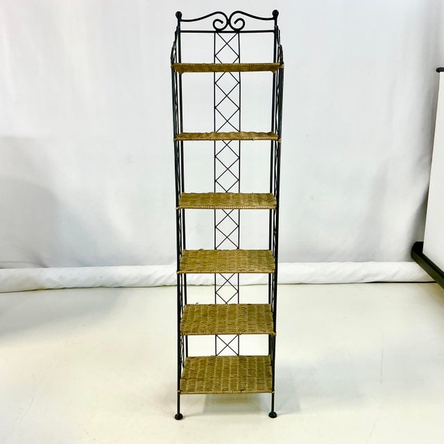 If you only have a small space but sorely need more storage, this vintage metal and wicker slim bookshelf is a great...