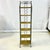 If you only have a small space but sorely need more storage, this vintage metal and wicker slim bookshelf is a great...