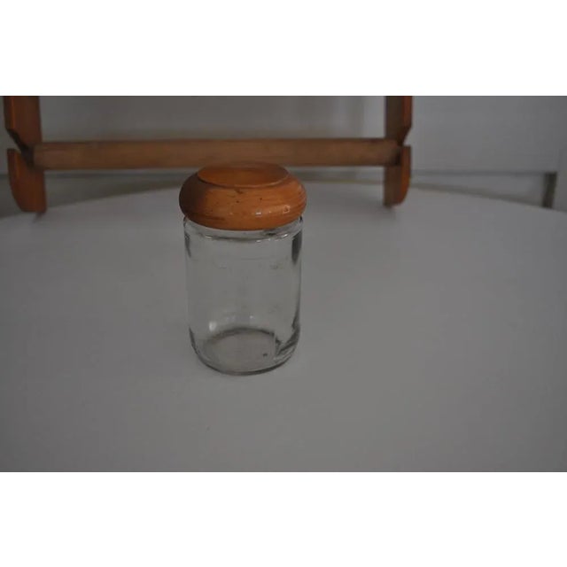 Vintage Wooden Spice Rack with Glass Bottles, Set of 6, in Very Good conditions. Designed 1950 to 1959