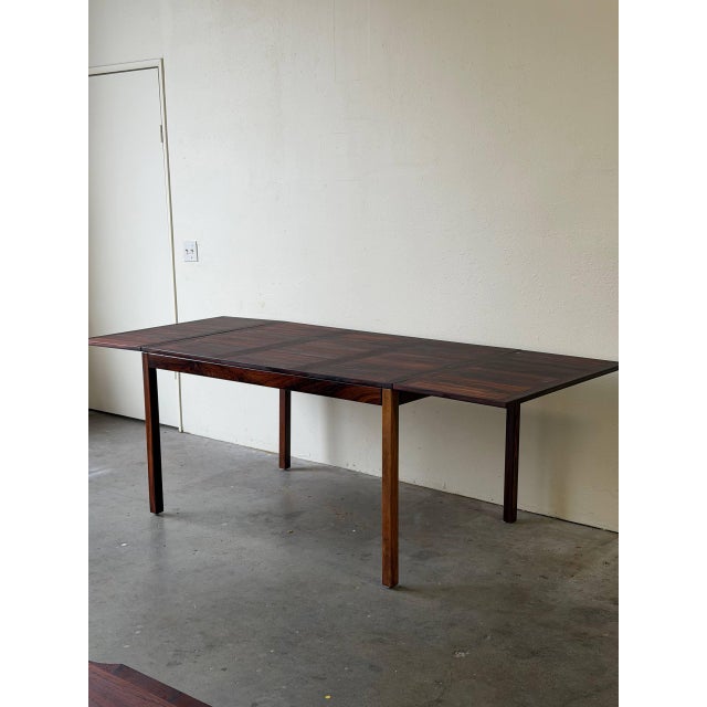 Authentic vintage Danish Mid-Century Modern rosewood dining table by Vejle Stole Møbelfabrik, made in Denmark circa 1960s....