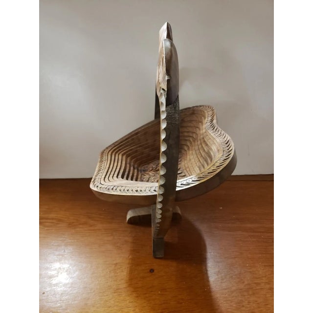 It measures 13" high, 10 1/4" wide and 8 1/4" deep while standing. The piece is in excellent overall condition with minor...