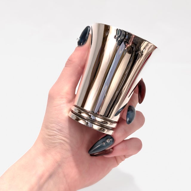 A fine signed set of 6 Danish Modern silver cocktail cups. By Georg Jensen. In sterling silver. Designed by Harald Nielsen...