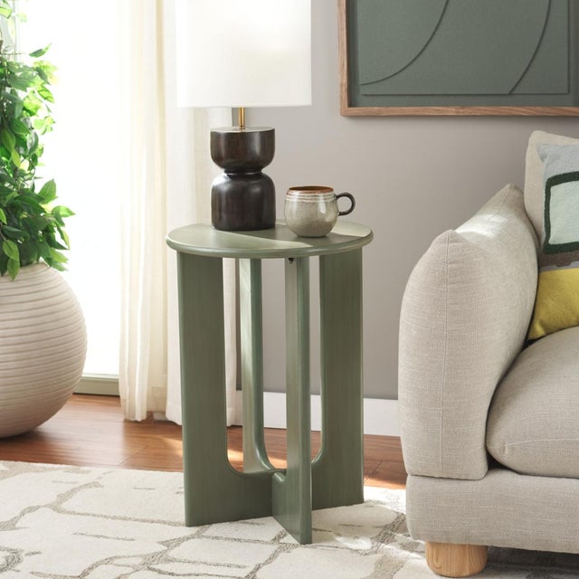 Introduce a pop of color and a dash of functionality into your home with our Ashanka End Table. Available in a vibrant...