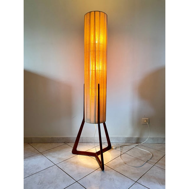 Tripod floor lamp (in the style of) Peter Hvidt and Olga Molgaard-Nielsen from the 1960s. Teak base and fabric slats (some...