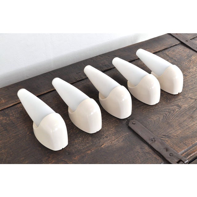 Beautiful, bauhaus-inspired wall lamps from the 1960s, designed and produced by the belgian company bo-niko. The large,...