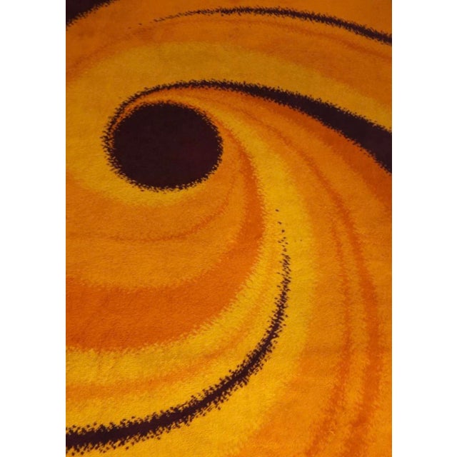Wool Rug in Orange & Brown by Reichel, Germany, 1970s, in Very Good conditions. Designed 1970 to 1979 This piece has an...