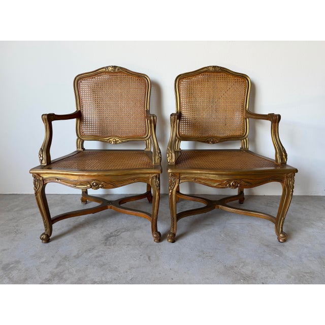 Hollywood Regency Vintage Hollywood Regency French Louis XV-Style Giltwood Cane Armchairs – A Pair For Sale - Image 3 of 14