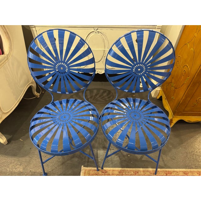 This is a pair of vintage pillow chairs. They have been repainted a beautiful specialty blue. The seat is bouncy. They are...