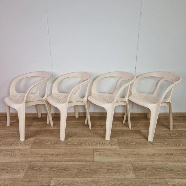 Vintage Garden Chairs by Henry Massonnet for Stamp, 1984s, Set of 4, in Very Good conditions. Designed 1980 to 1989 This...