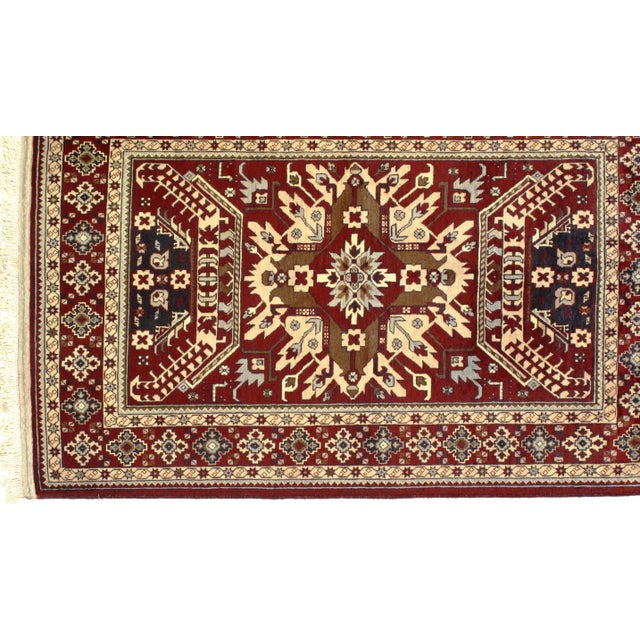 Tekke rug is a type of handmade floor-covering textile traditionally originating in Russia. The piece was hand-knotted...