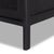 Black-finished mango frames black cane-front drawers, bringing a textural, monochromatic look to bedroom storage.