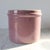 Vintage stoneware crock in a mauve color. No makers mark. Does show signs of age wear and use. One chip. Pictured.