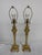 Design Plus Gallery presents a Pair of Candlestick Table Lamps in Brass. These stately and traditional table lamps have an...