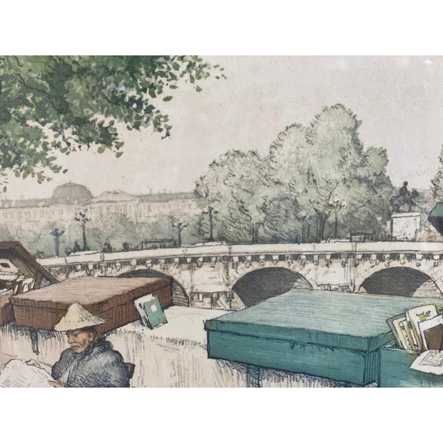 Capture the charm of Paris with this antique-inspired wall art print featuring the iconic booksellers along the Seine....