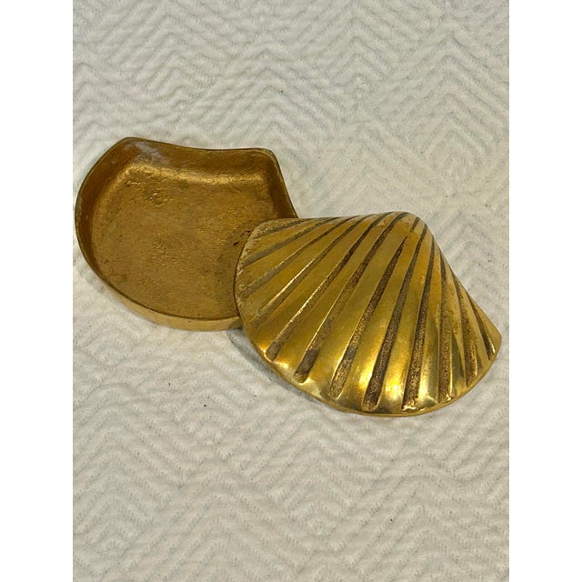 At 3.75” wide, this petite brass box is perfect for holding you rings on a dresser or counter. It is solid brass cast in...