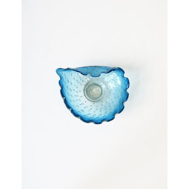 A beautiful Italian Murano blue and silver art glass bowl with asymmetric design and scalloped edge, circa mid-20th...