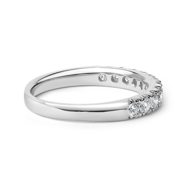 Crafted from polished 14K white gold and adorned with a rhodium plating for added brilliance, this classic band marries...
